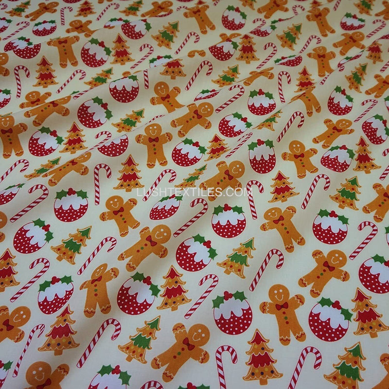 Cream Polycotton Fabric with Gingerbread Men & Christmas Puddings (Per Metre)