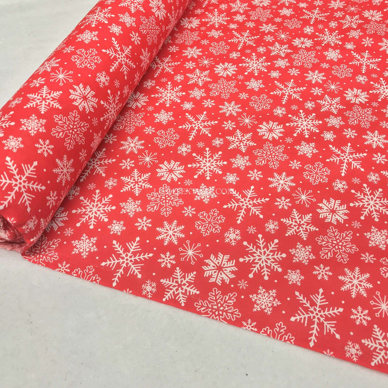 Tissu polycoton de Noël avec des flocons de neige congelés, rouge